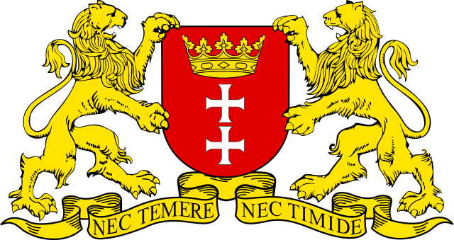 Herb Gdańska - Dwa Lwy spoglądające na siebie nawzajem. Trzymające czerwoną tarczę. Na tarczy od dołu, jeden na drugim - dwa białe krzyże i złota korona u góry tarczy. Na dole wstęga z napisem "NEC TEMERE - NEC TIMIDE"